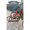 晋中创意抽象骑车青蛙雕塑 玻璃钢园林景观青蛙摆饰